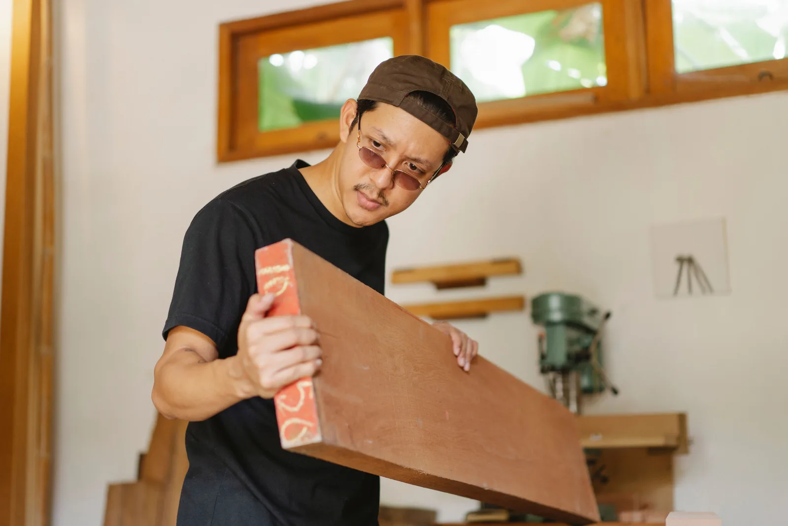 Selecting a hardwood slab in the workshop