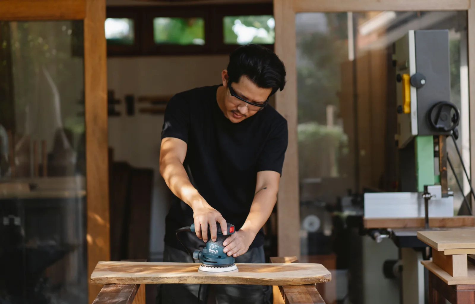 Sanding the board smooth before oiling